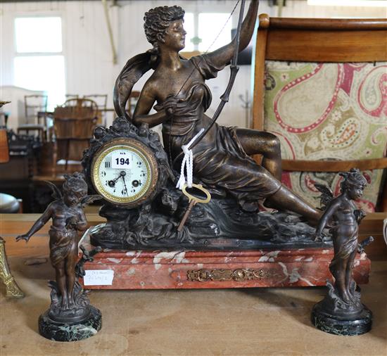 French spelter clock and a pair of figures